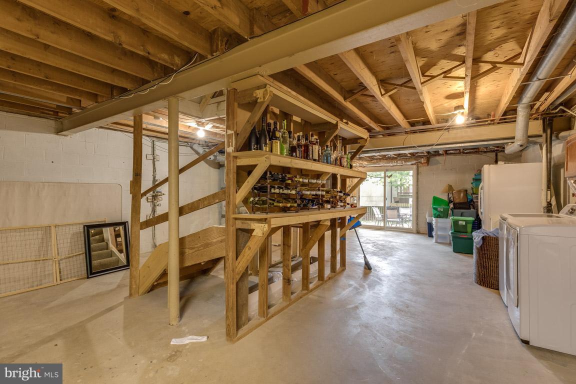 11841 Dunlop Court Reston, VA 20191 - Photo 30 of 30 a view of an empty room with wooden floor