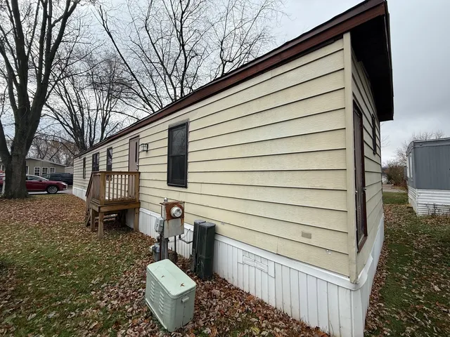 a view of a back yard of the house