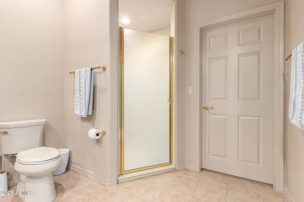 a bathroom with a toilet and a sink