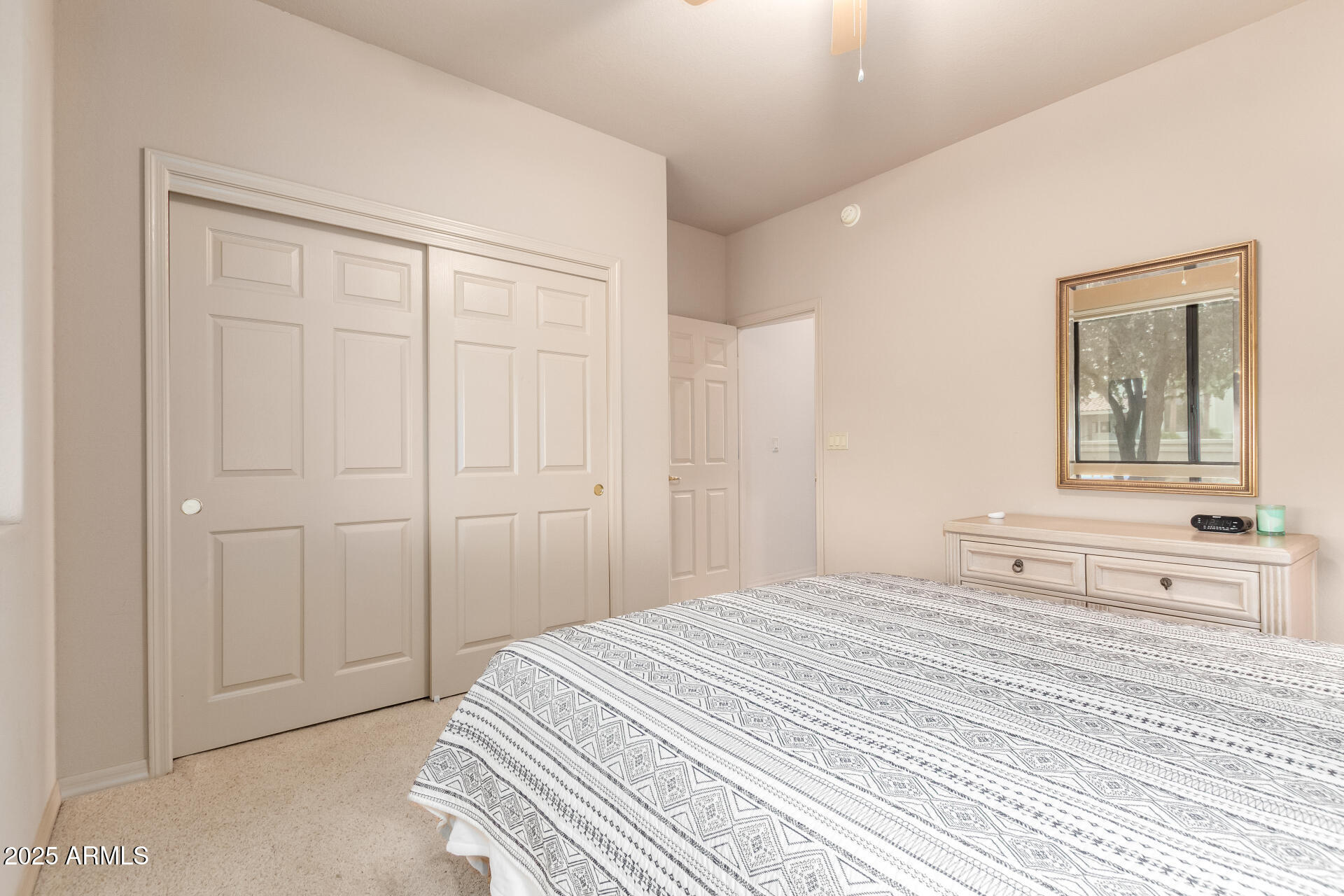 25621 North Sago Drive Rio Verde, AZ 85263 - Photo 20 of 45 a spacious bedroom with a bed and a window