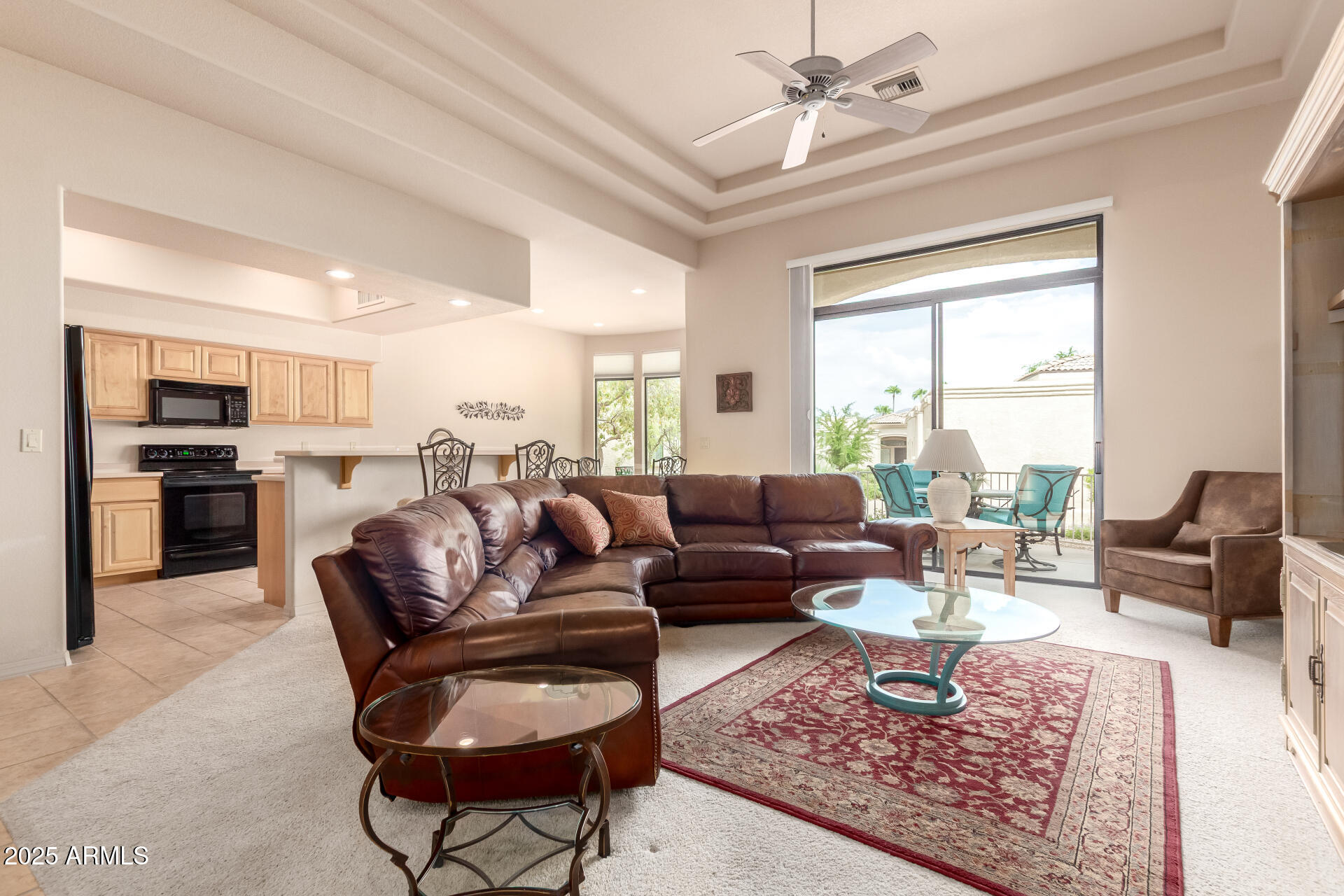 25621 North Sago Drive Rio Verde, AZ 85263 - Photo 7 of 45 a living room with furniture wooden floor and a fireplace