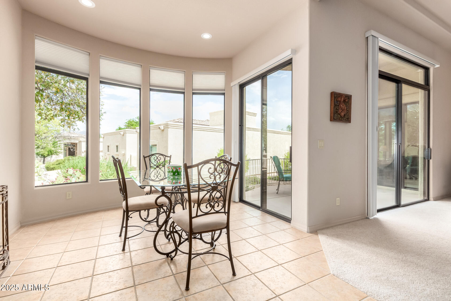 25621 North Sago Drive Rio Verde, AZ 85263 - Photo 8 of 45 a view of a dining room with furniture and windows