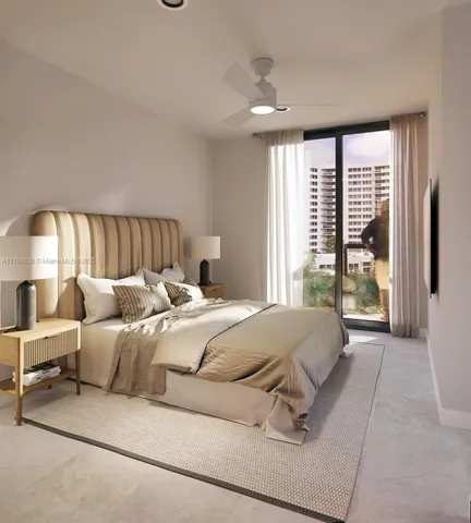 a bedroom with a large bed and a large window