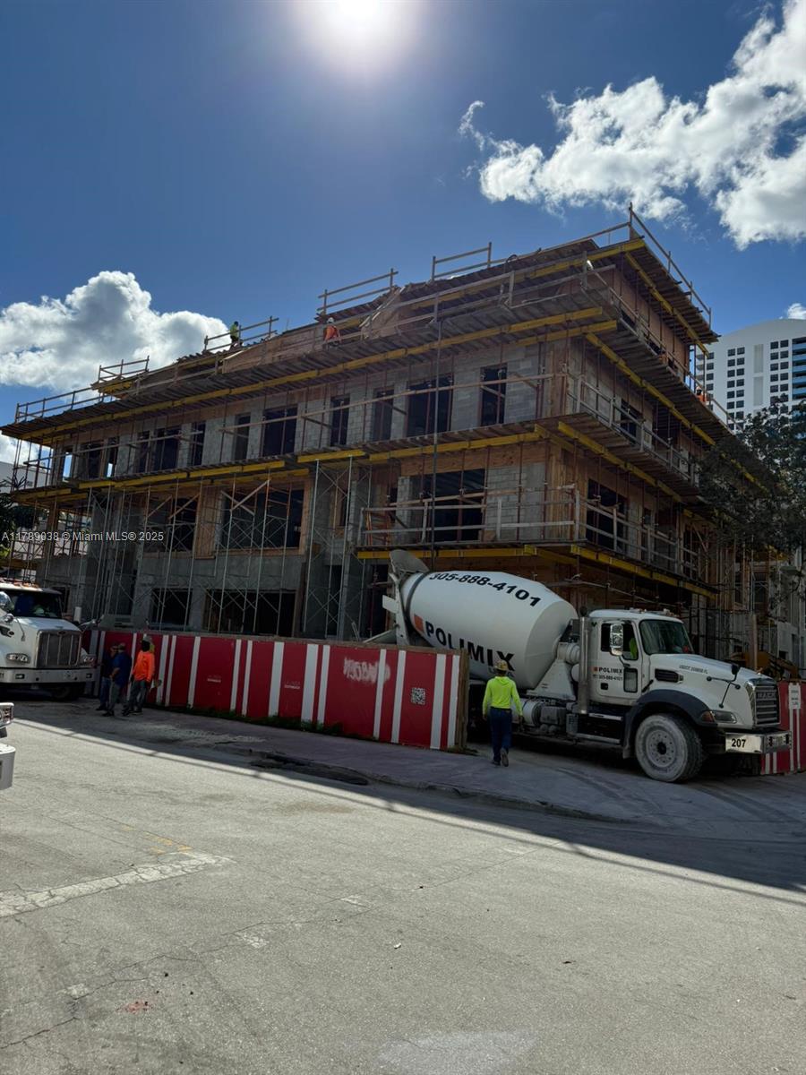 1425 Bay Road Miami Beach, FL 33139 - Photo 2 of 15 a car parked in front of a building