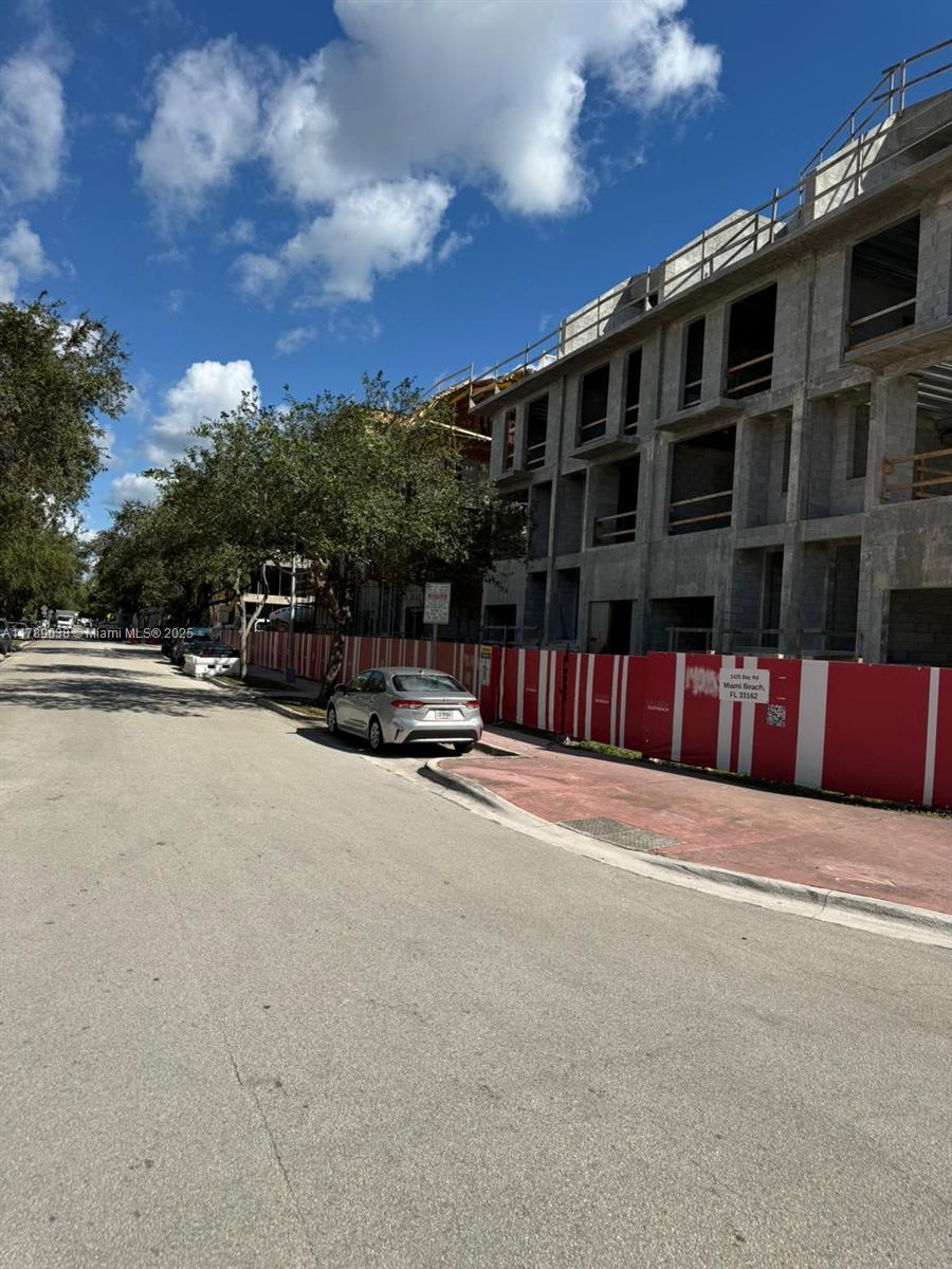 1425 Bay Road Miami Beach, FL 33139 - Photo 3 of 15 a view of building with large trees