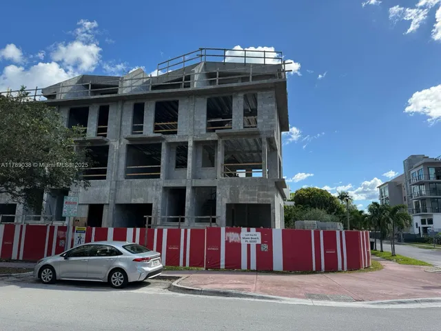 a car parked in front of a building