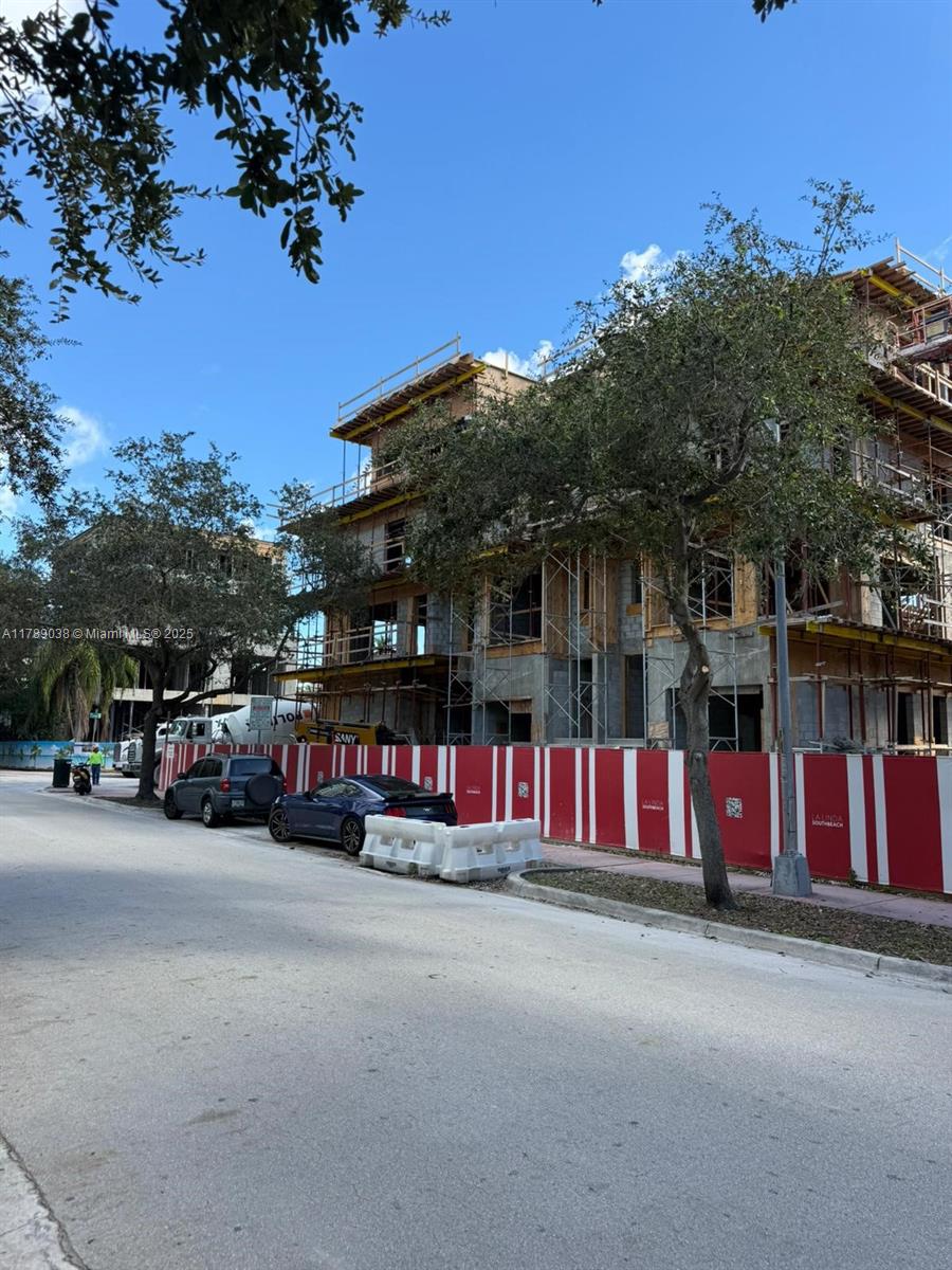 1425 Bay Road Miami Beach, FL 33139 - Photo 6 of 15 a view of street with parked cars