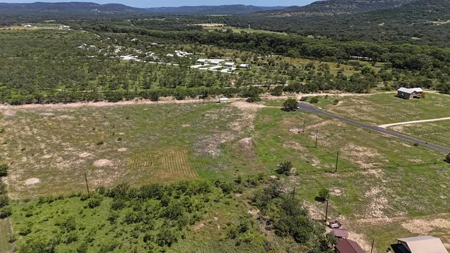 a view of a lake with mountains in the background