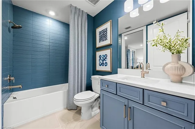 a view of a dining room with furniture water view and a garden