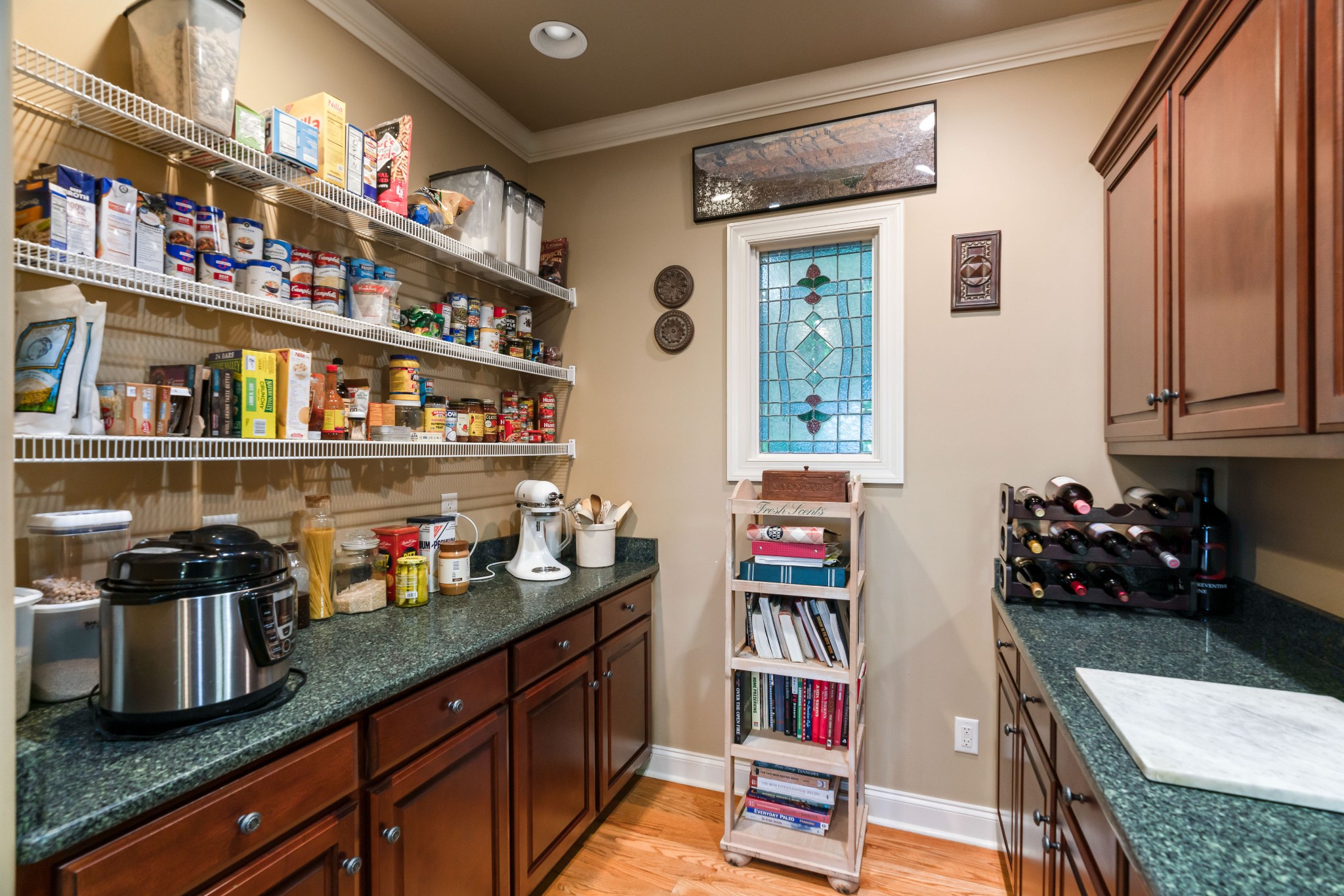 1976 Cooks Road Mount Juliet, TN 37122 - Photo 29 of 70 a kitchen with granite countertop lots of clutter and stainless steel appliances