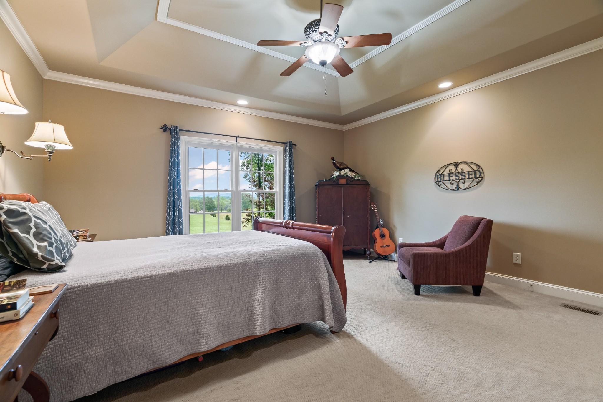 1976 Cooks Road Mount Juliet, TN 37122 - Photo 40 of 70 a bedroom with a bed and a chandelier