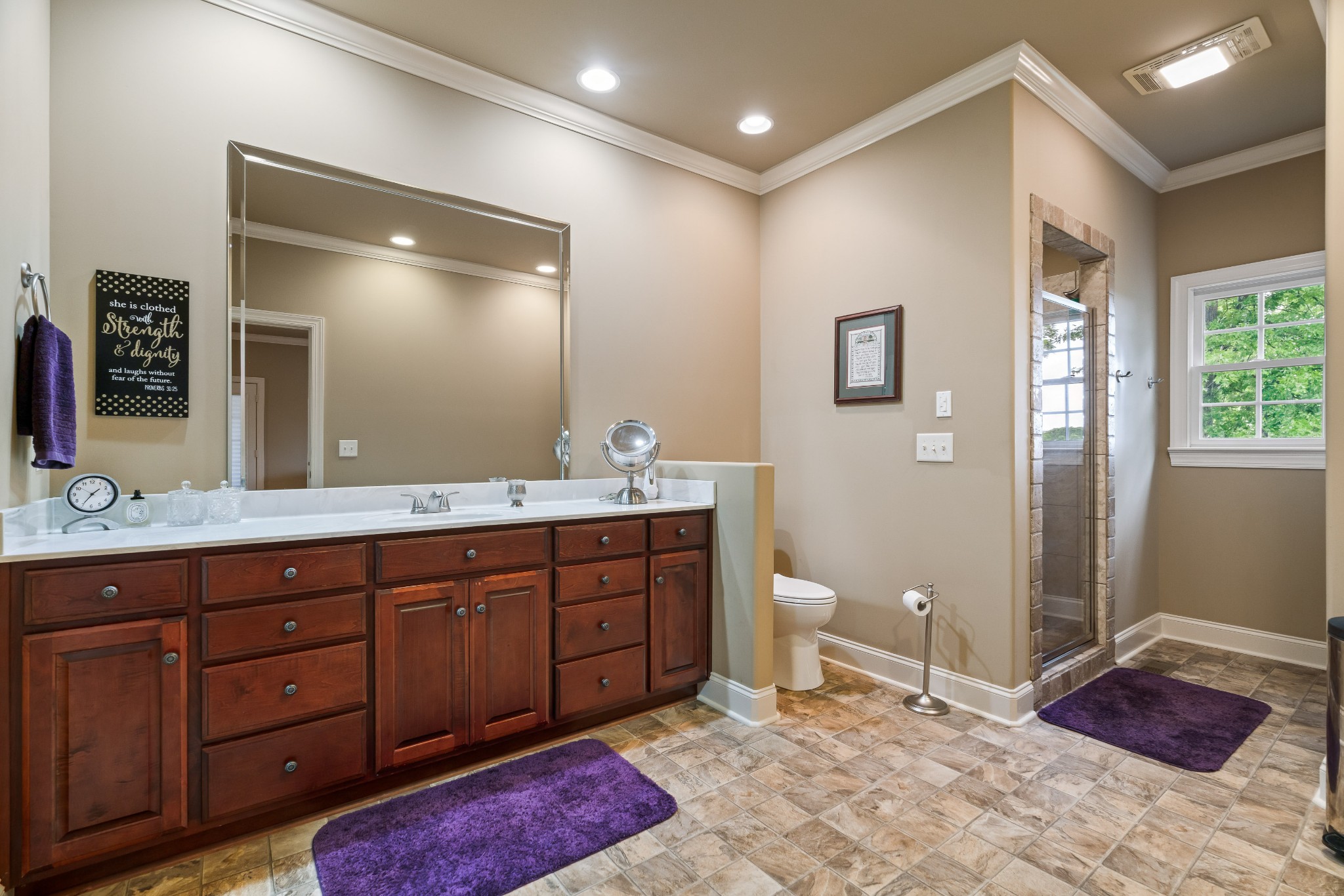 1976 Cooks Road Mount Juliet, TN 37122 - Photo 41 of 70 a spacious bathroom with a double vanity sink and a mirror