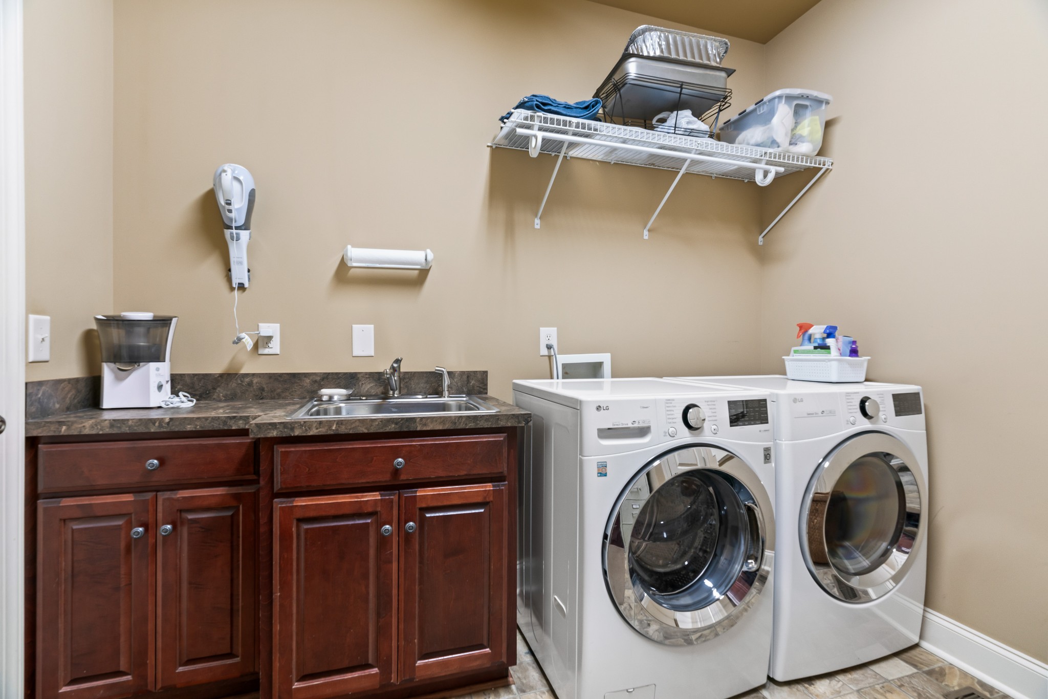 1976 Cooks Road Mount Juliet, TN 37122 - Photo 52 of 70 a utility room with sink dryer and washer