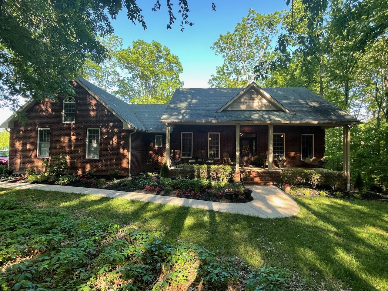 1976 Cooks Road Mount Juliet, TN 37122 - Photo 67 of 70 a view of a house with a yard porch and sitting area