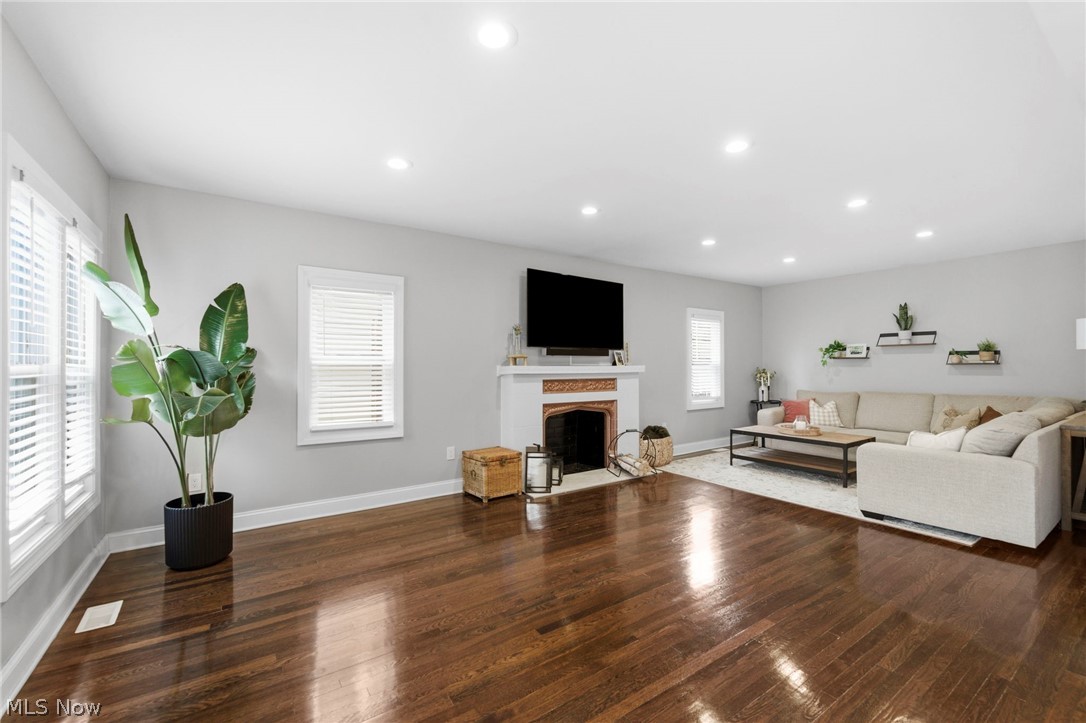 3525 Silsby Road Cleveland, OH 44118 - Photo 2 of 44 Living room with a fireplace, hardwood / wood-style floors, and recessed lighting