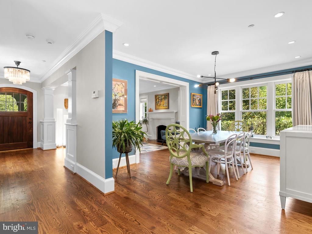 4400 Elm Street Chevy Chase, MD 20815 - Photo 14 of 61 a view of a dining room with furniture window and wooden floor