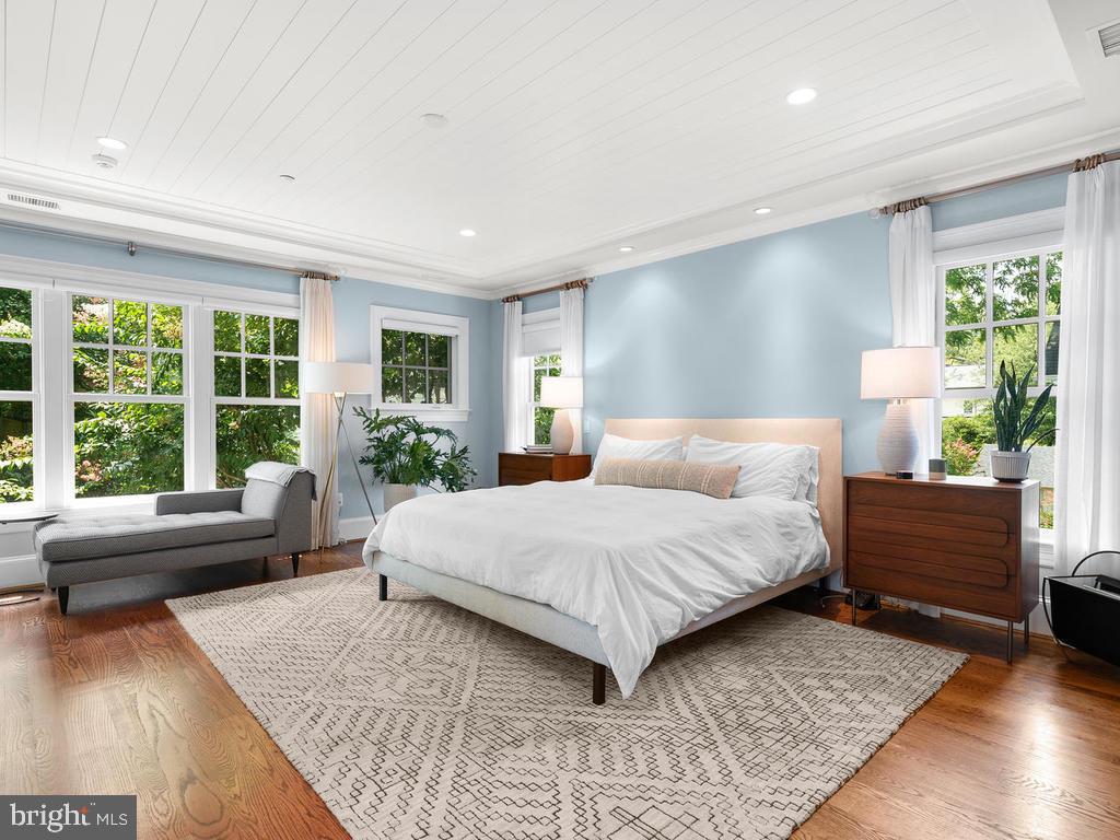 4400 Elm Street Chevy Chase, MD 20815 - Photo 24 of 61 a bedroom with a large bed and windows