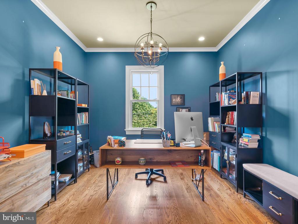 4400 Elm Street Chevy Chase, MD 20815 - Photo 29 of 61 a workspace with furniture window and wooden floor