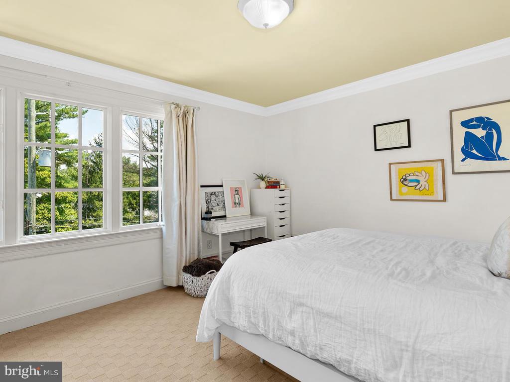 4400 Elm Street Chevy Chase, MD 20815 - Photo 37 of 61 a bedroom with a bed and a window