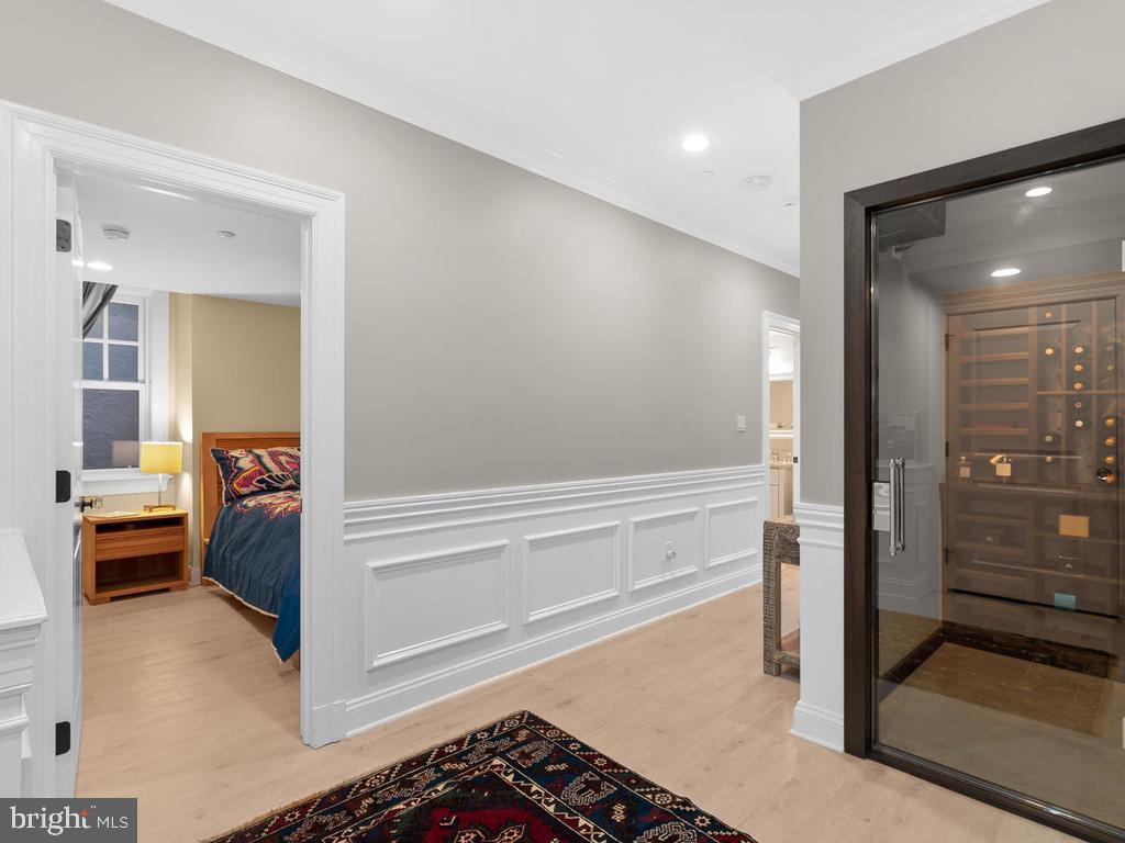 4400 Elm Street Chevy Chase, MD 20815 - Photo 40 of 61 a bathroom with a tub and shower
