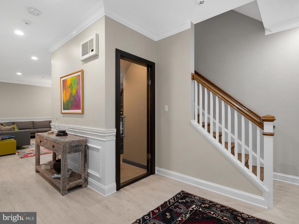4400 Elm Street Chevy Chase, MD 20815 - Photo 42 of 61 a view of a hallway with workspace