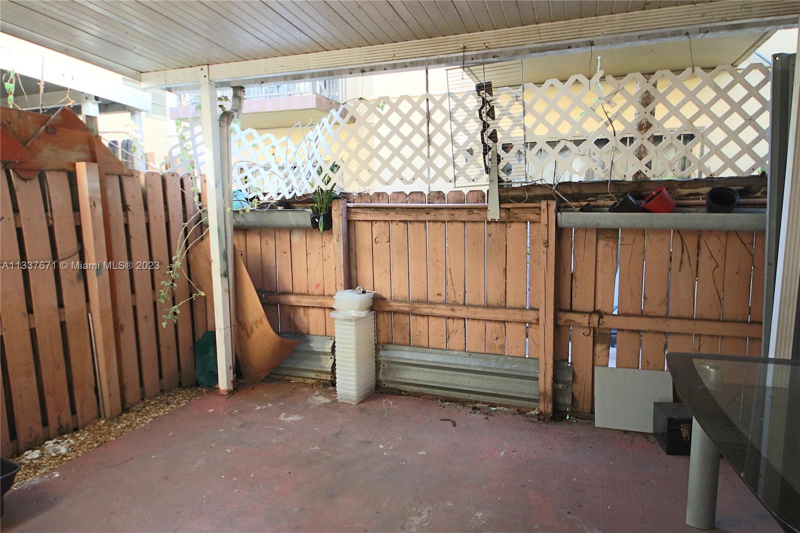 655 West 68th Street, Unit 10 Hialeah, FL 33014 - Photo 18 of 19 a view of two chairs in the room