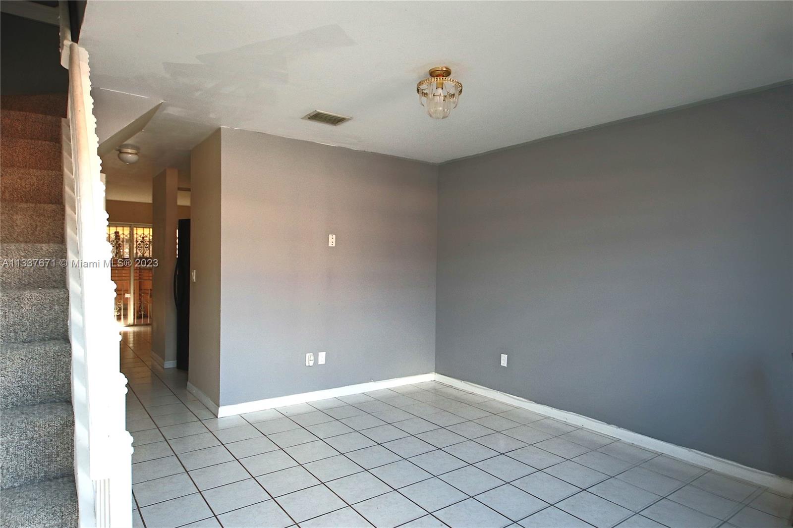 655 West 68th Street, Unit 10 Hialeah, FL 33014 - Photo 3 of 19 a view of an empty room