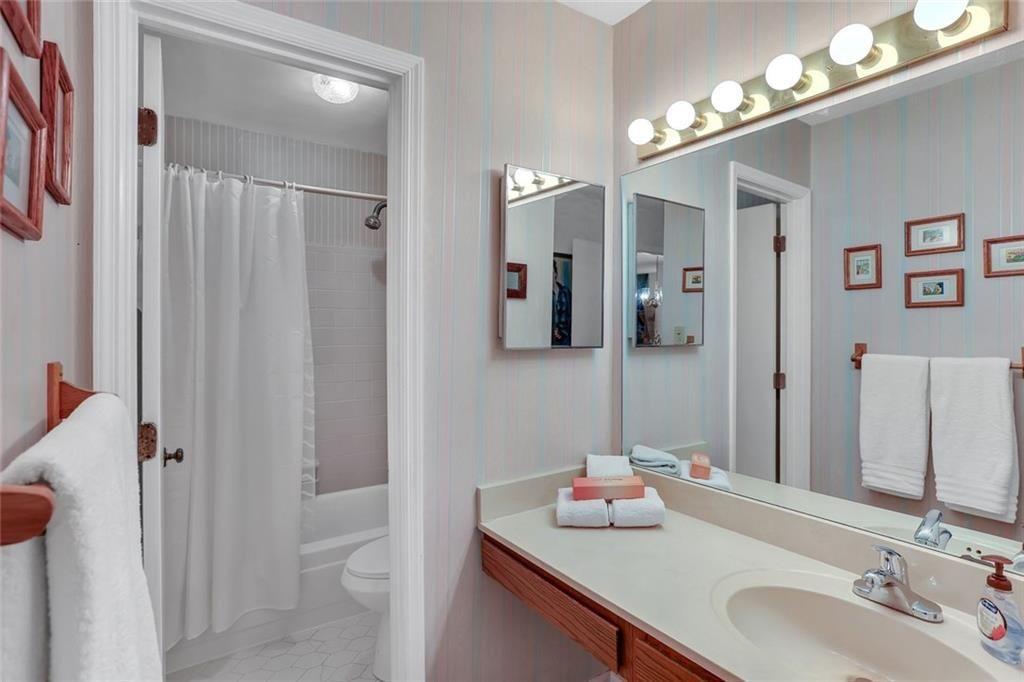 3445 Ivys Walk Atlanta, GA 30340 - Photo 12 of 21 a bathroom with a sink double vanity and a mirror