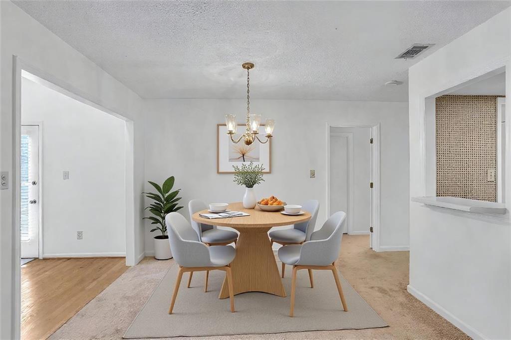 3445 Ivys Walk Atlanta, GA 30340 - Photo 3 of 21 a dining room with furniture and window