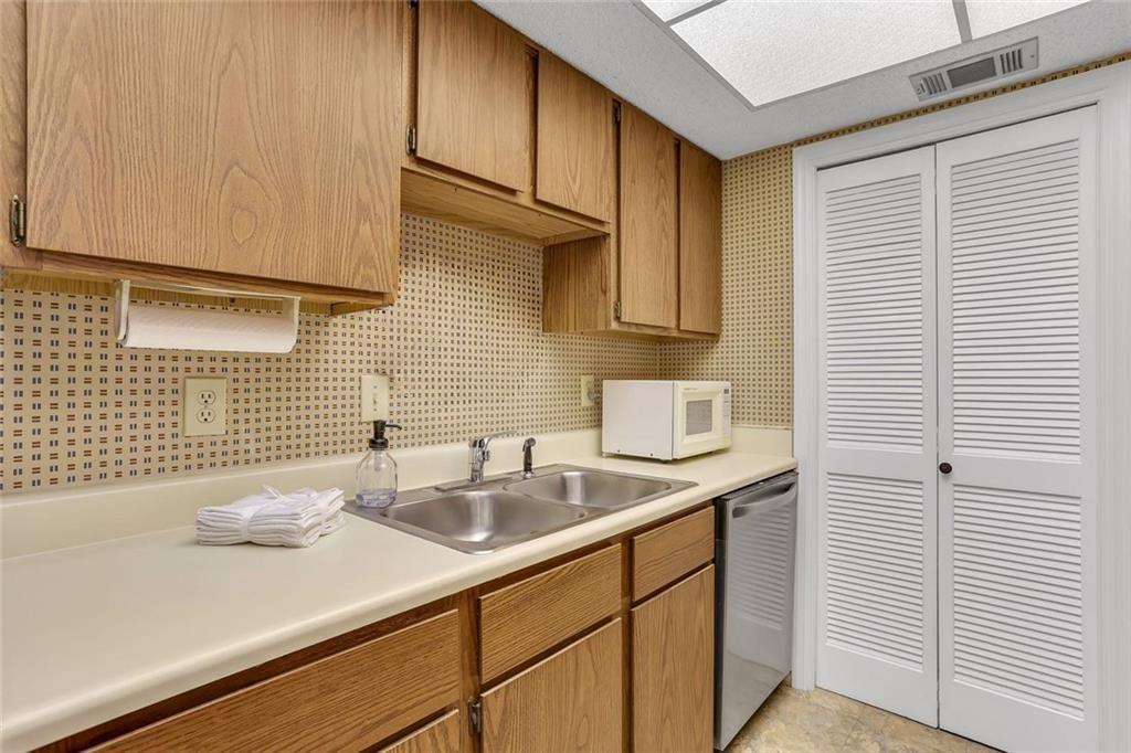 3445 Ivys Walk Atlanta, GA 30340 - Photo 6 of 21 a bathroom with a sink and a mirror