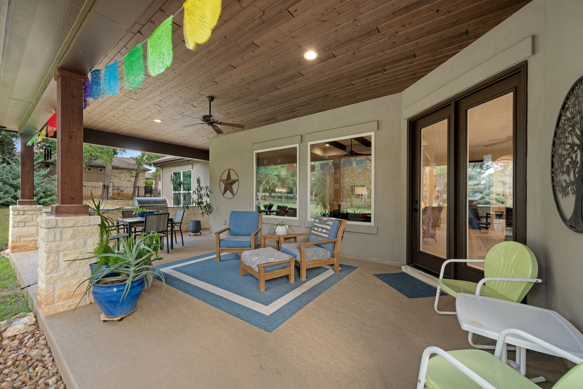 212 Marbella Way Georgetown, TX 78633 - Photo 31 of 40 a living room with furniture potted plant and a large window