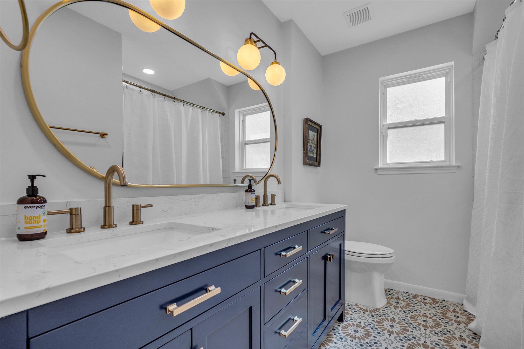 2526 Teague Road Houston, TX 77080 - Photo 34 of 41 This beautifully appointed secondary bathroom serves as a perfect blend of style and functionality.
