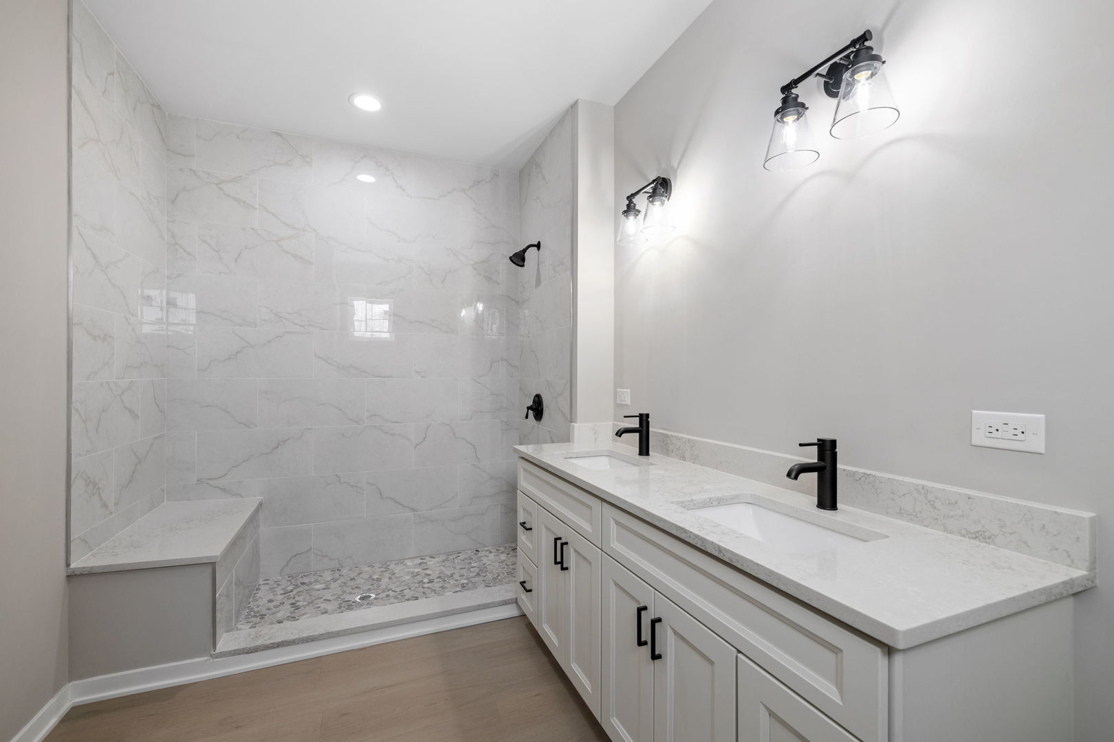 203 Hickory Street Peotone, IL 60468 - Photo 12 of 20 a bathroom with a sink a toilet and shower