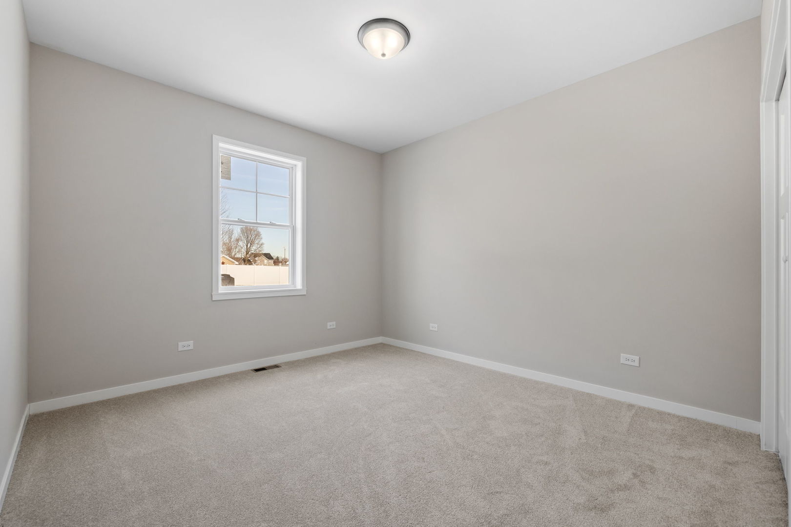 203 Hickory Street Peotone, IL 60468 - Photo 16 of 20 an empty room with windows