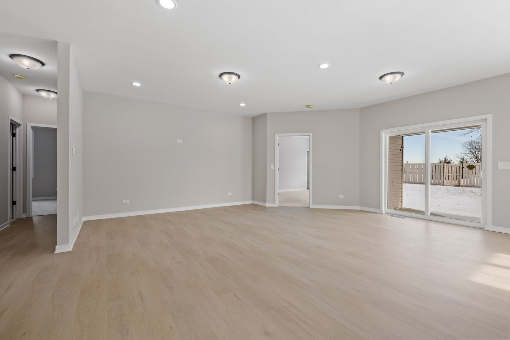 203 Hickory Street Peotone, IL 60468 - Photo 7 of 20 a view of an empty room with glass door and balcony