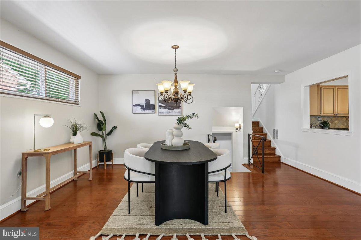 3709 Kenway Street Silver Spring, MD 20906 - Photo 14 of 34 a view of a dining room with furniture and wooden floor