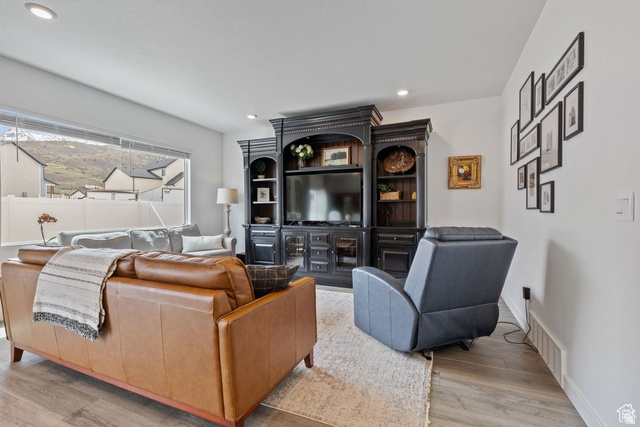 1323 South Raintree Lane Santaquin, UT 84655 - Photo 5 of 23 Living room with light wood-style floors and recessed lighting