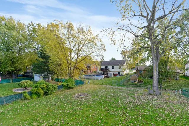 a view of a yard in front of house