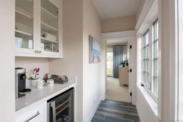 a kitchen with stainless steel appliances granite countertop a sink and cabinets