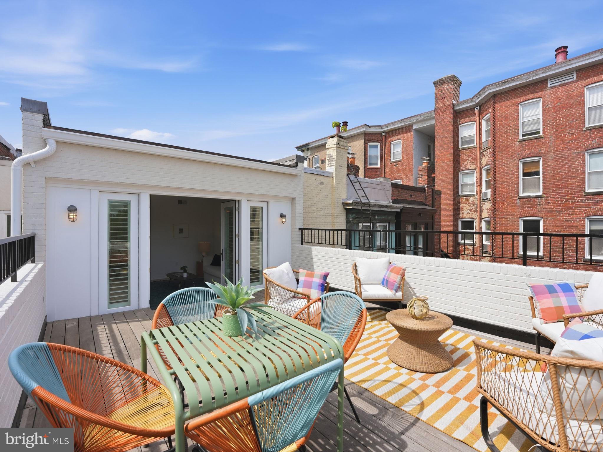 1845 Calvert Street Northwest Washington, DC 20009 - Photo 32 of 48 a outdoor space with a table and chairs