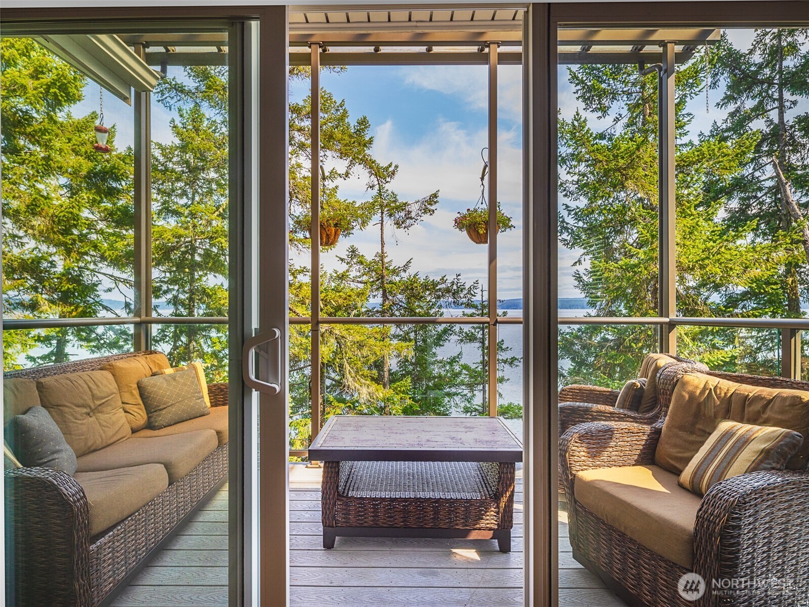 291 Pleasant Harbor Road Brinnon, WA 98320 - Photo 13 of 40 a balcony with furniture and garden view