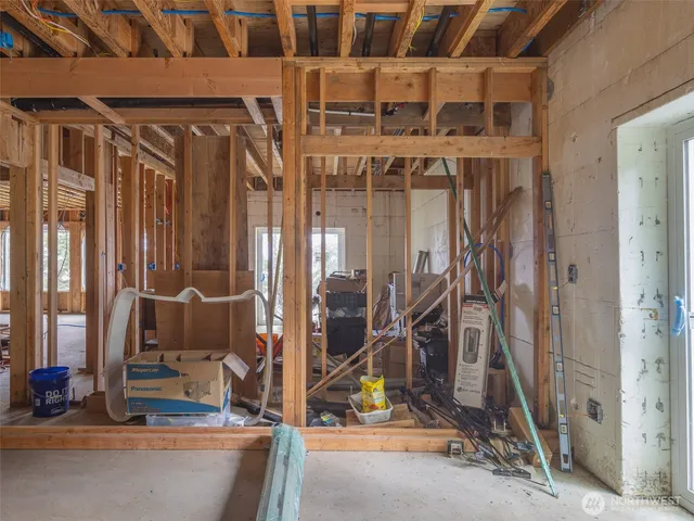 a view of patio with a table and chairs