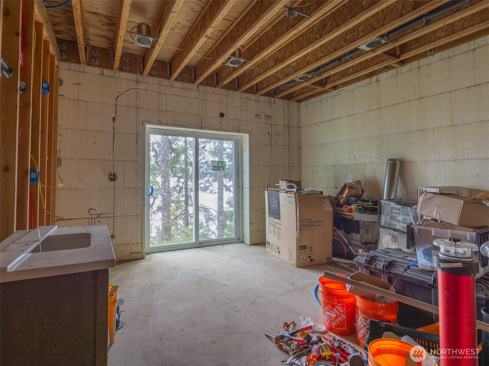 291 Pleasant Harbor Road Brinnon, WA 98320 - Photo 35 of 40 a room with storage and utility