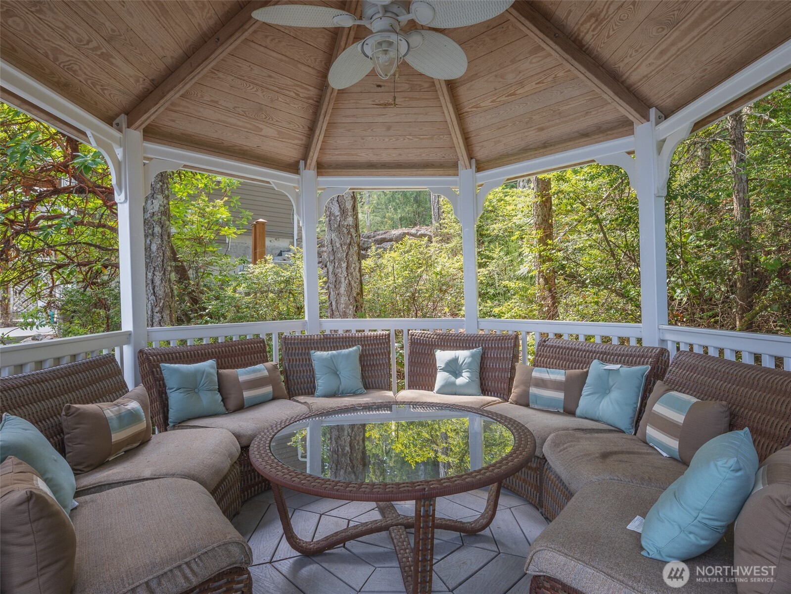 291 Pleasant Harbor Road Brinnon, WA 98320 - Photo 36 of 40 a view of patio with a table and chairs