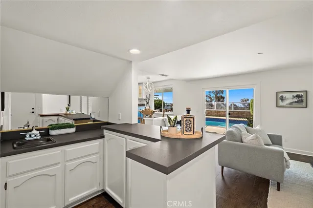 a kitchen with a sink cabinets and counter space