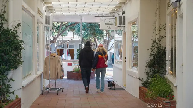 a view of path along with building and trees