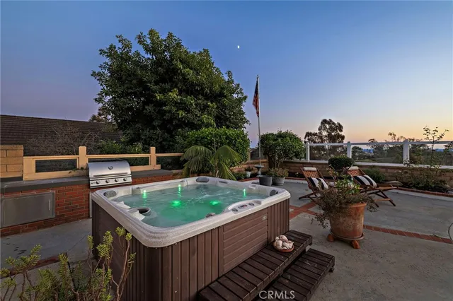 a view of a chairs and table on the terrace