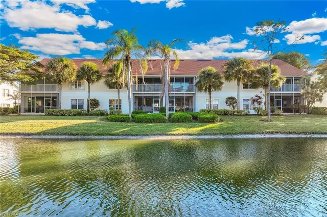 a view of a building with a big yard