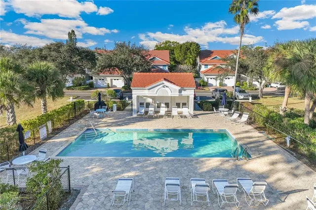 a view of swimming pool with a patio