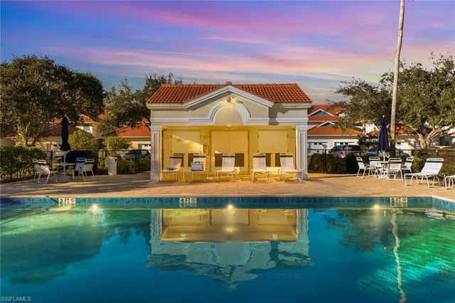 a swimming pool with outdoor view